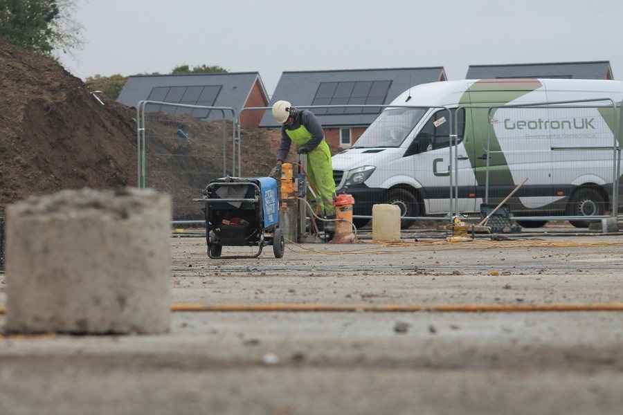 Geotron crew preparing a site investigation location